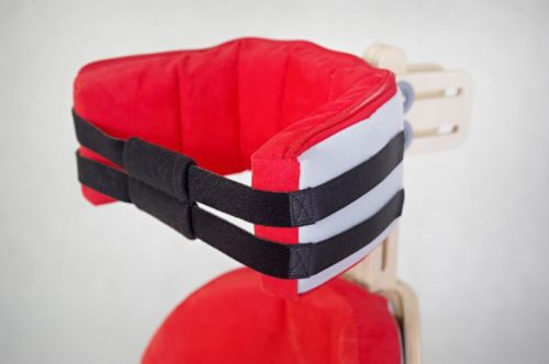 Head supporting belt for positioning chair 