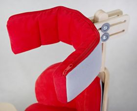 Adjustable headrest for positioning chair "Nook"